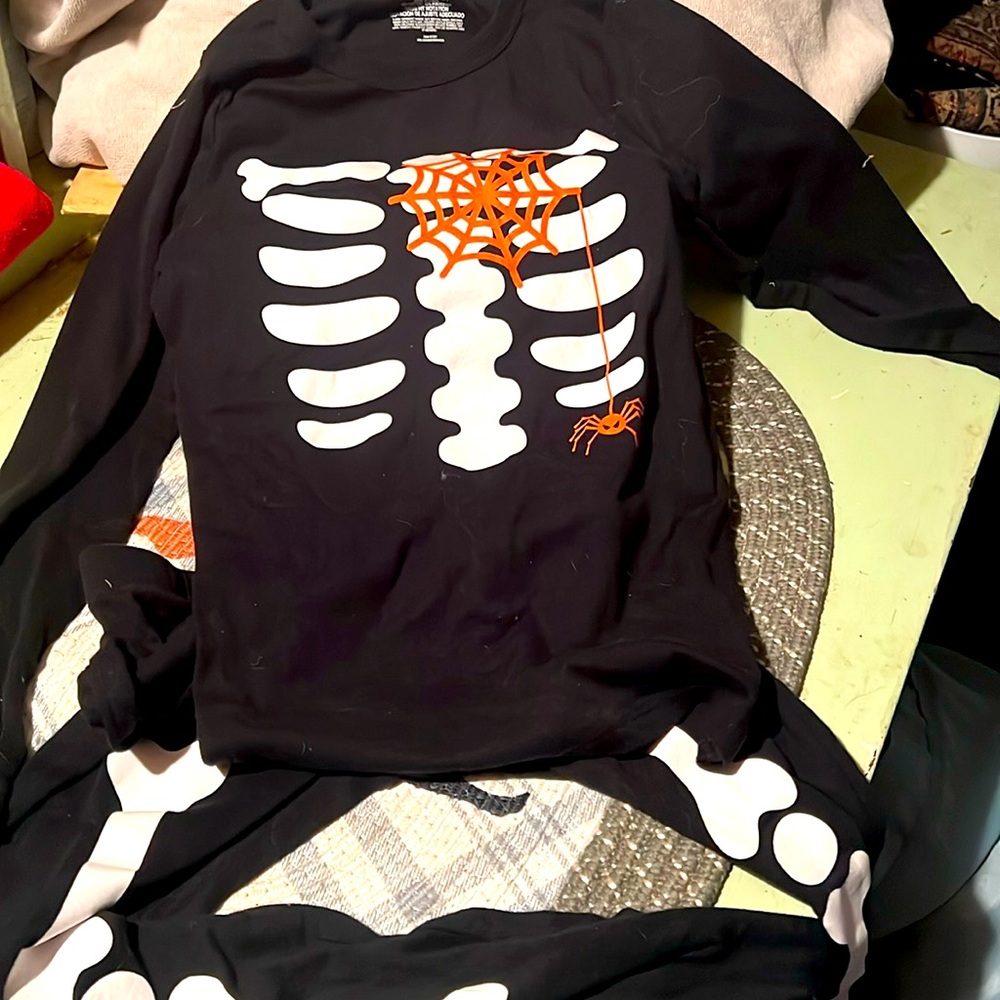 Glow in the dark Halloween pjs never worn